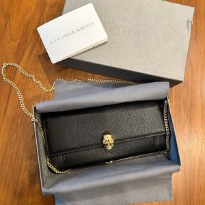 Alexander McQueen wallet with straps